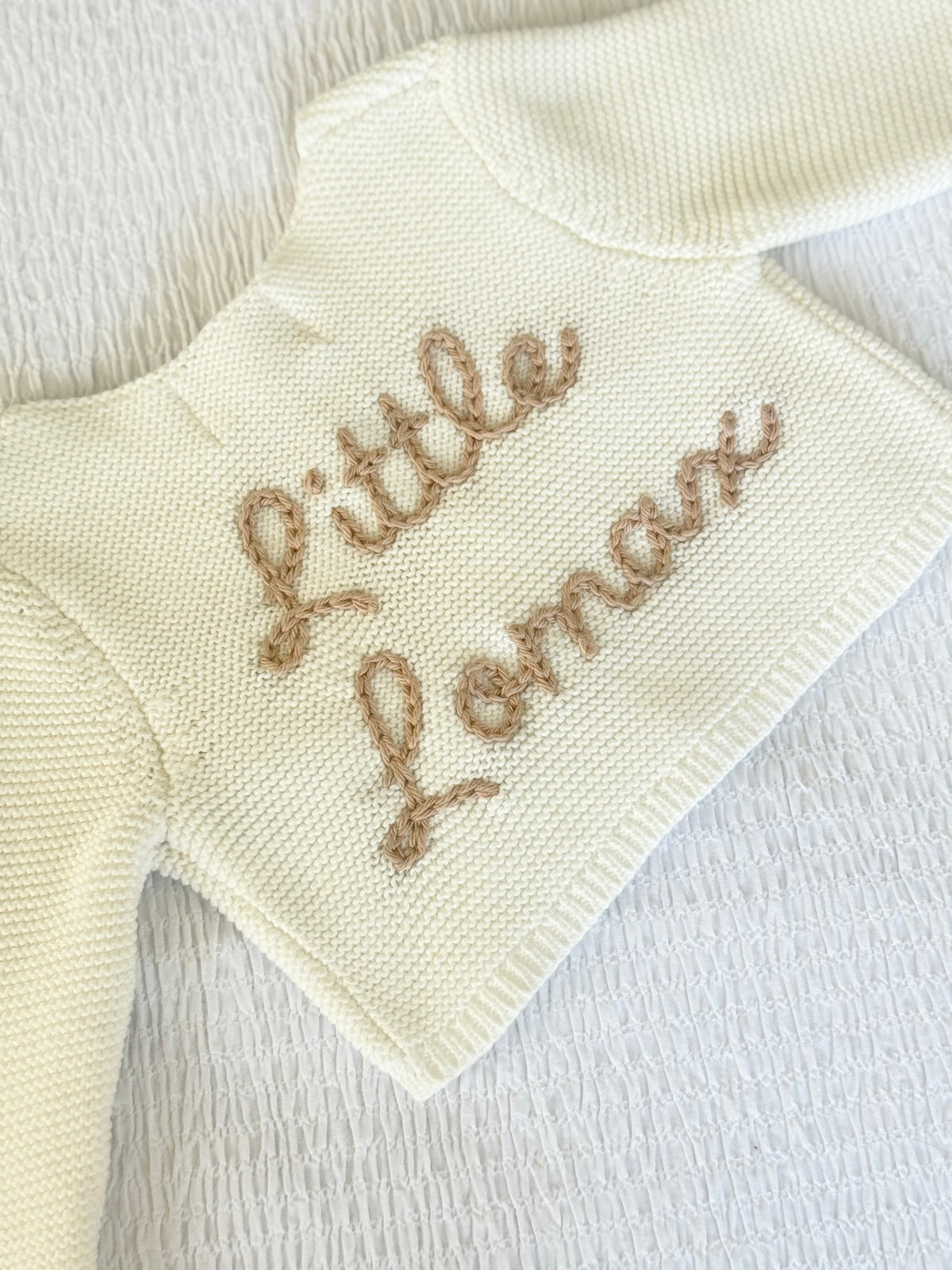 Cream unisex baby cardigan