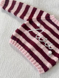 Pink and burgundy stripe hand-knit