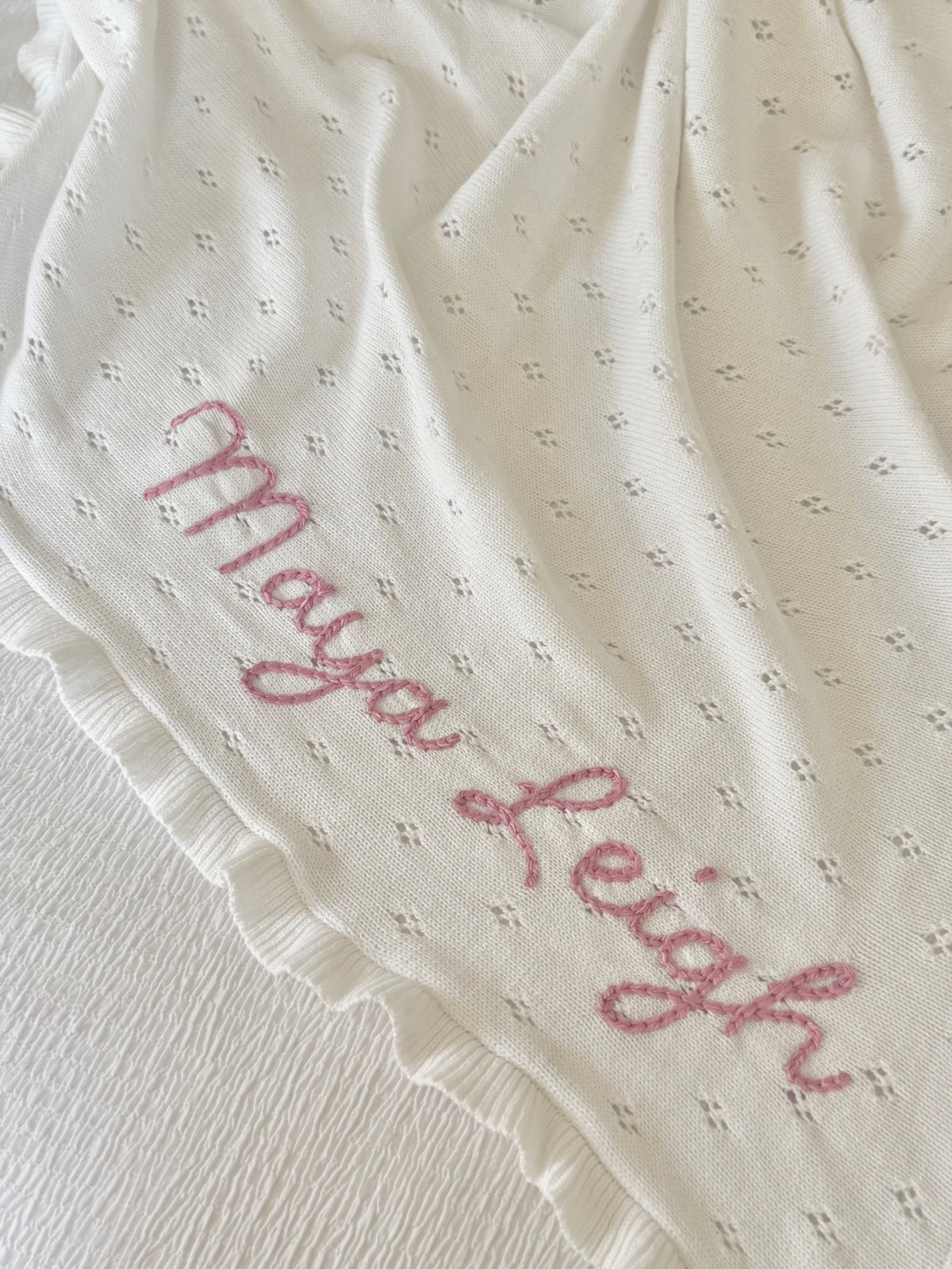 White ruffle baby blanket