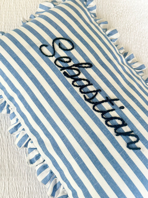 Blue and white ruffle cushion