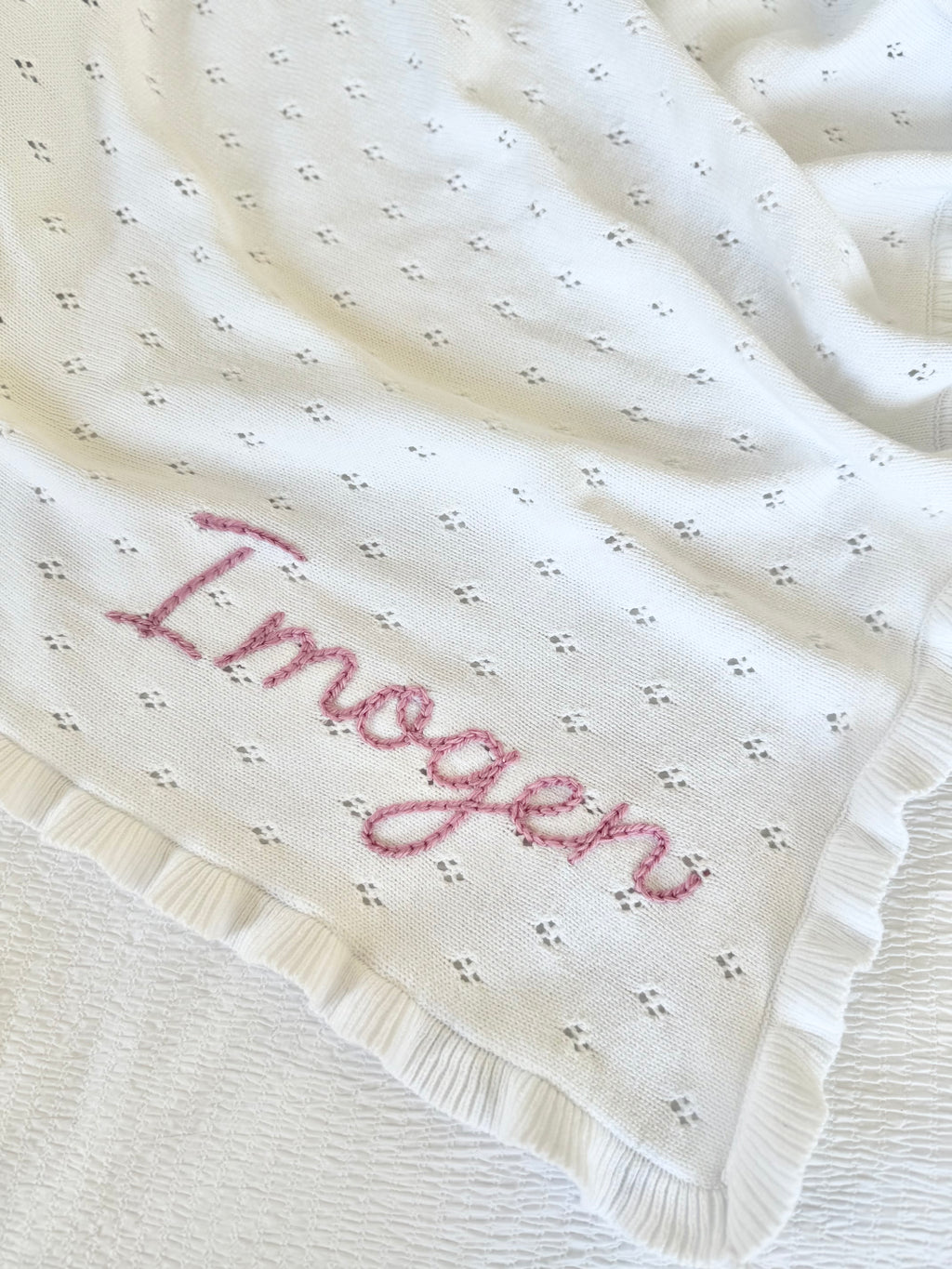 White ruffle baby blanket