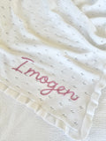 White ruffle baby blanket