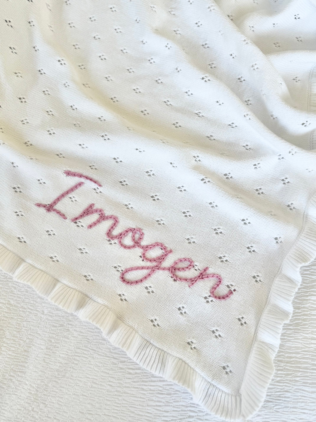 White ruffle baby blanket