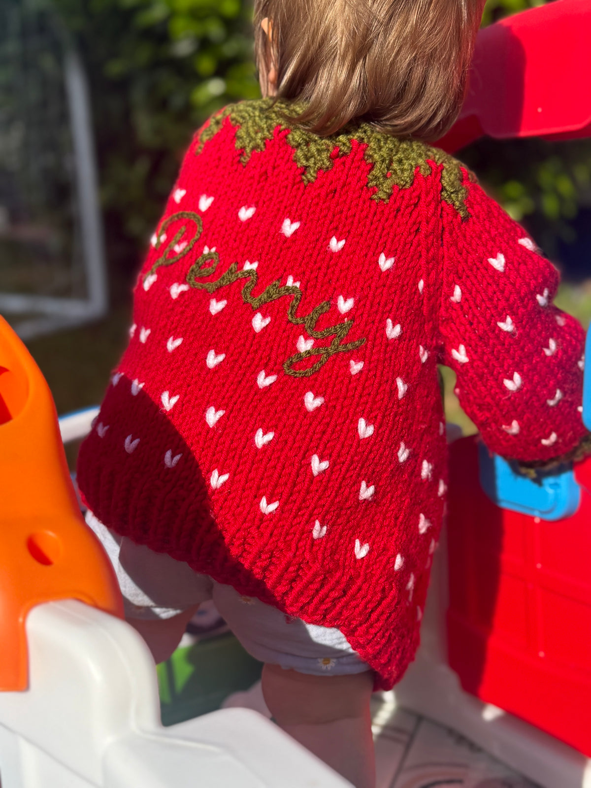 Strawberry hand knitted cardigan